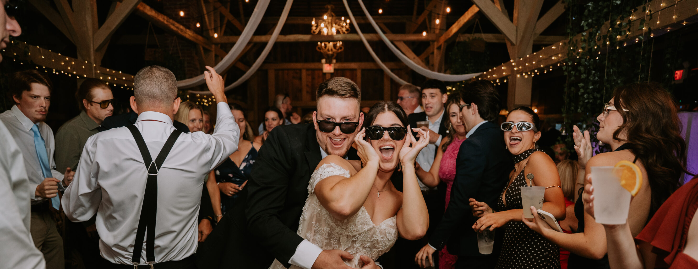 Crowd dancing at wedding reception in the Poconos