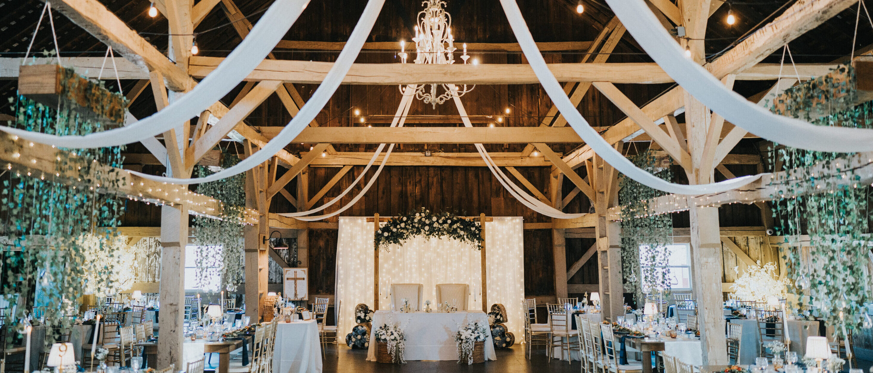 Couple getting married by a lake in the Poconos mountains
