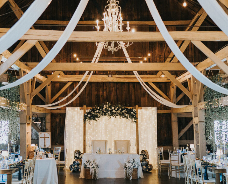 Couple getting married by a lake in the Poconos mountains