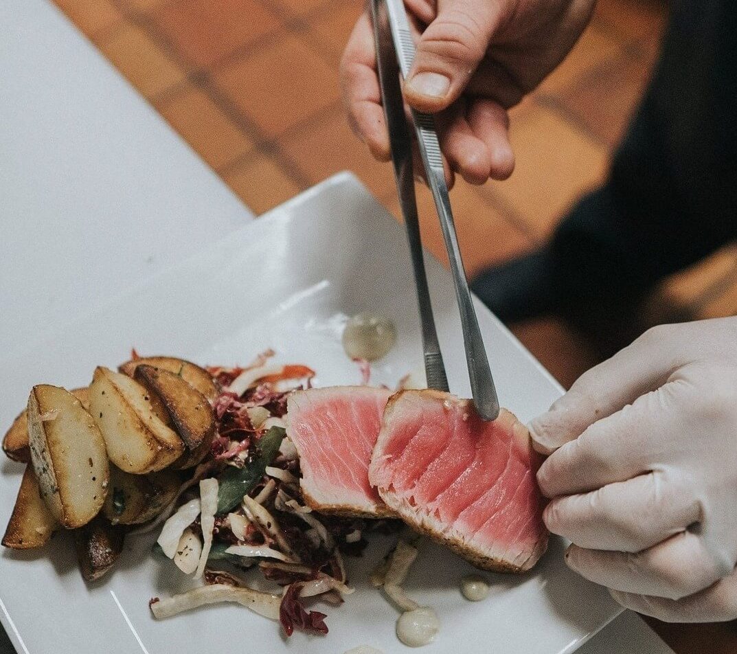 Chef preparing ahi at lakeside restaurant in the Poconos