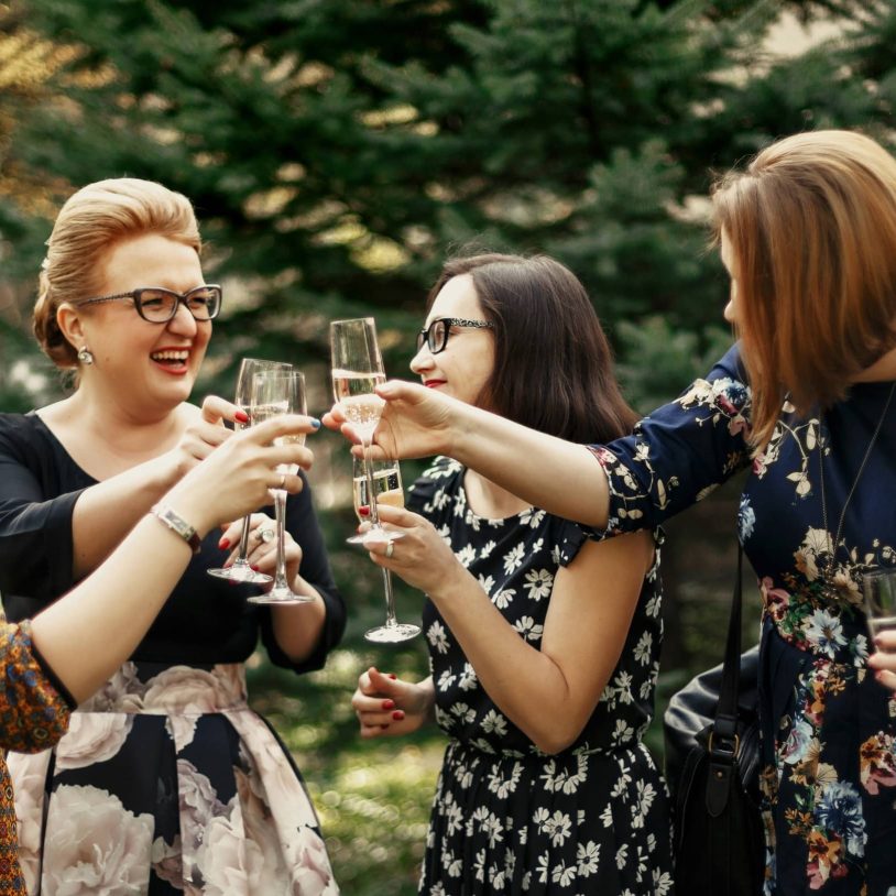 Women holding Champagne glasses at Poconos mountain retreat