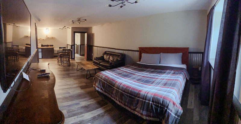 king bed in suite at grange valley in poconos