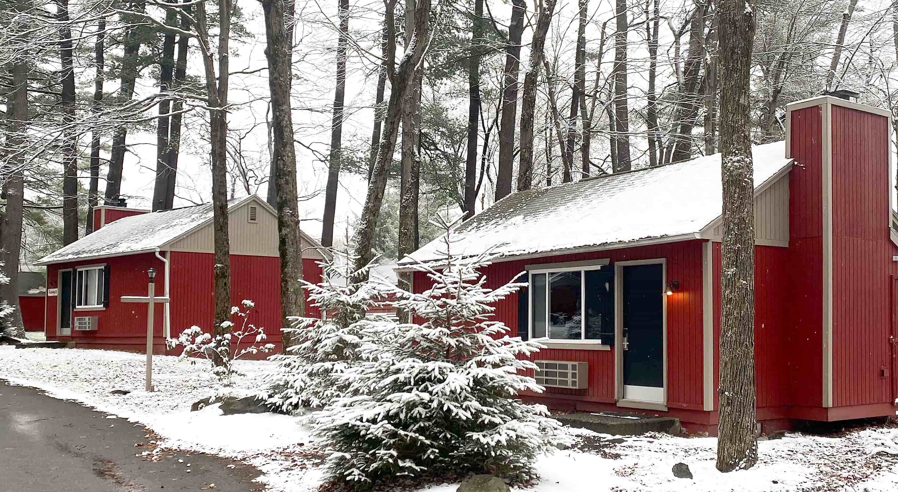 Snow covered cottages at year-round lodge in the Poconos
