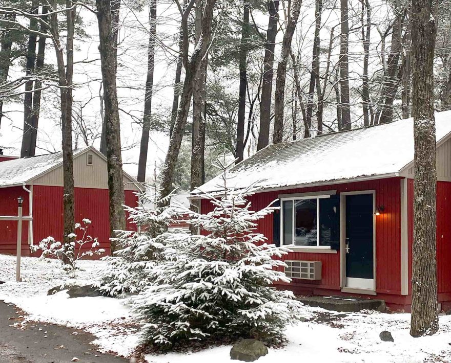 Snow covered cottages at year-round lodge in the Poconos