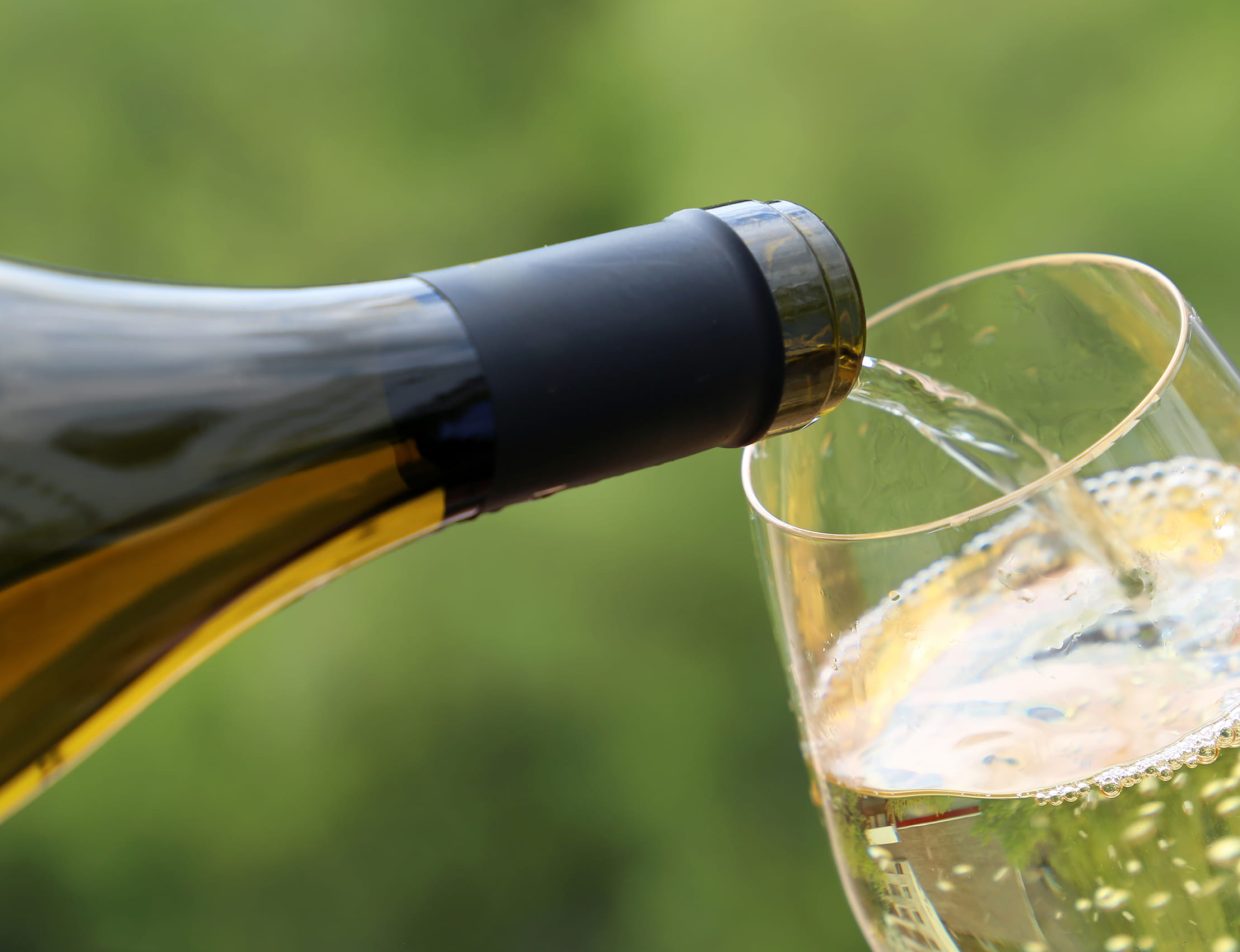 White wine pouring into glass at Grange Valley