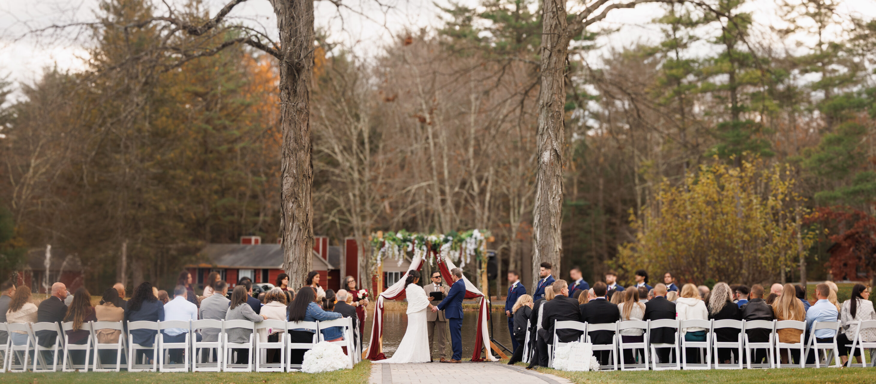Couple kissing in barn at mountains wedding venue in the Poconos