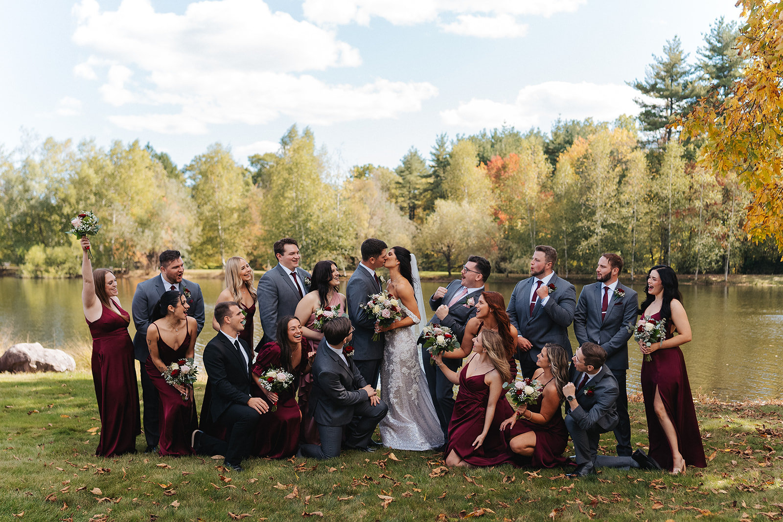 Couple kissing in barn at lakefront wedding venue in the Poconos Mountains